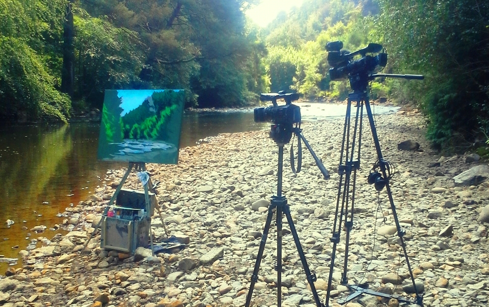 DVD shoot day shows a half painted canvas alongside the Avoca River.