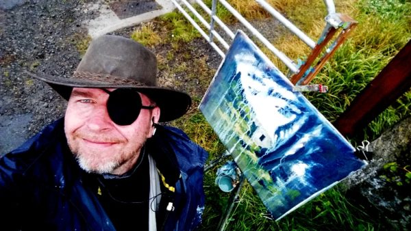Rod Coyne complete with eyepatch and a freshly completed plein air painting.
