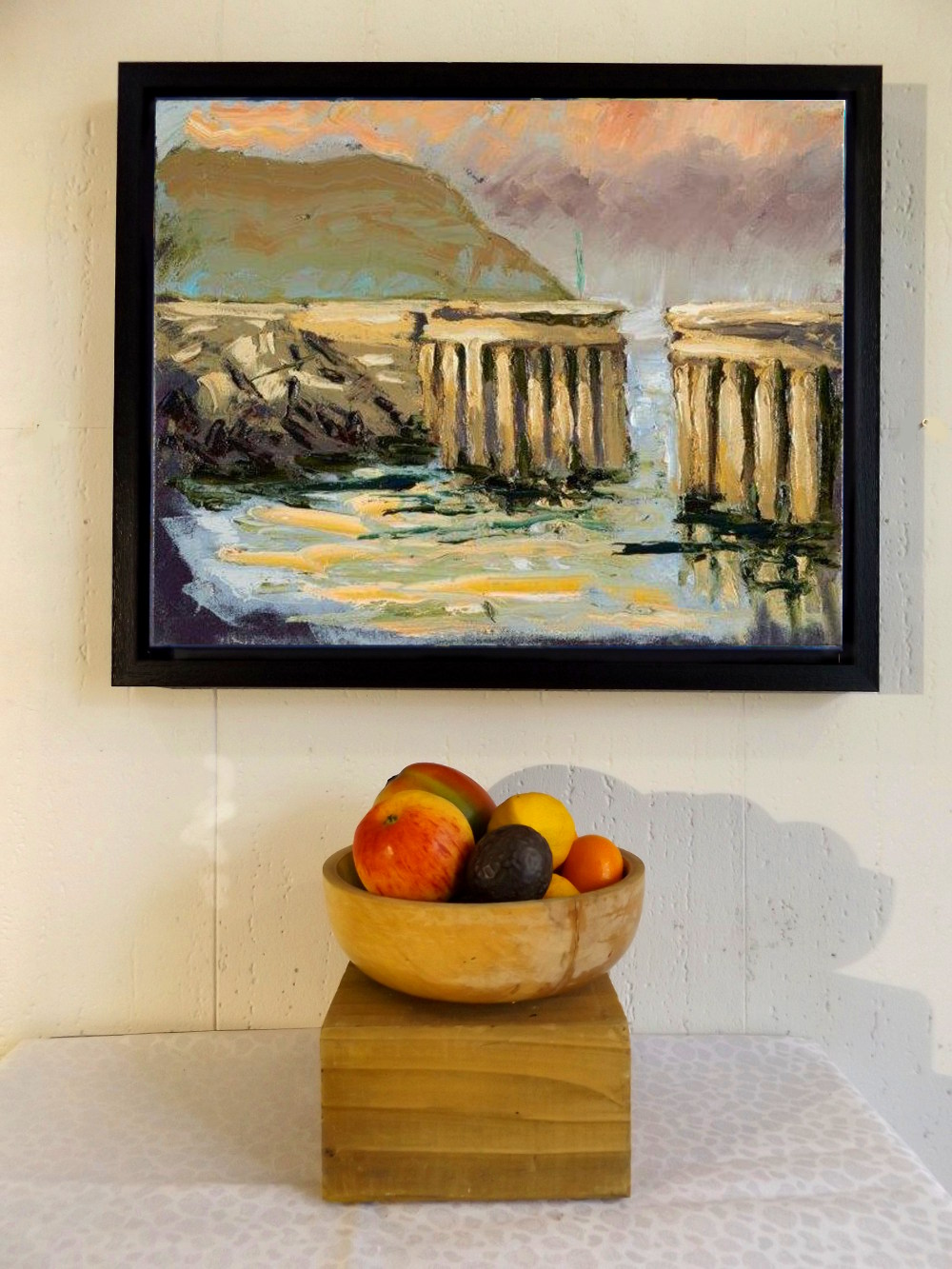 Greystones Harbour framed canvas print with fruit bowl.