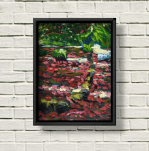Rhododendron Broadwalk Kilmacurragh canvas print framed in black on a white brick wall.
