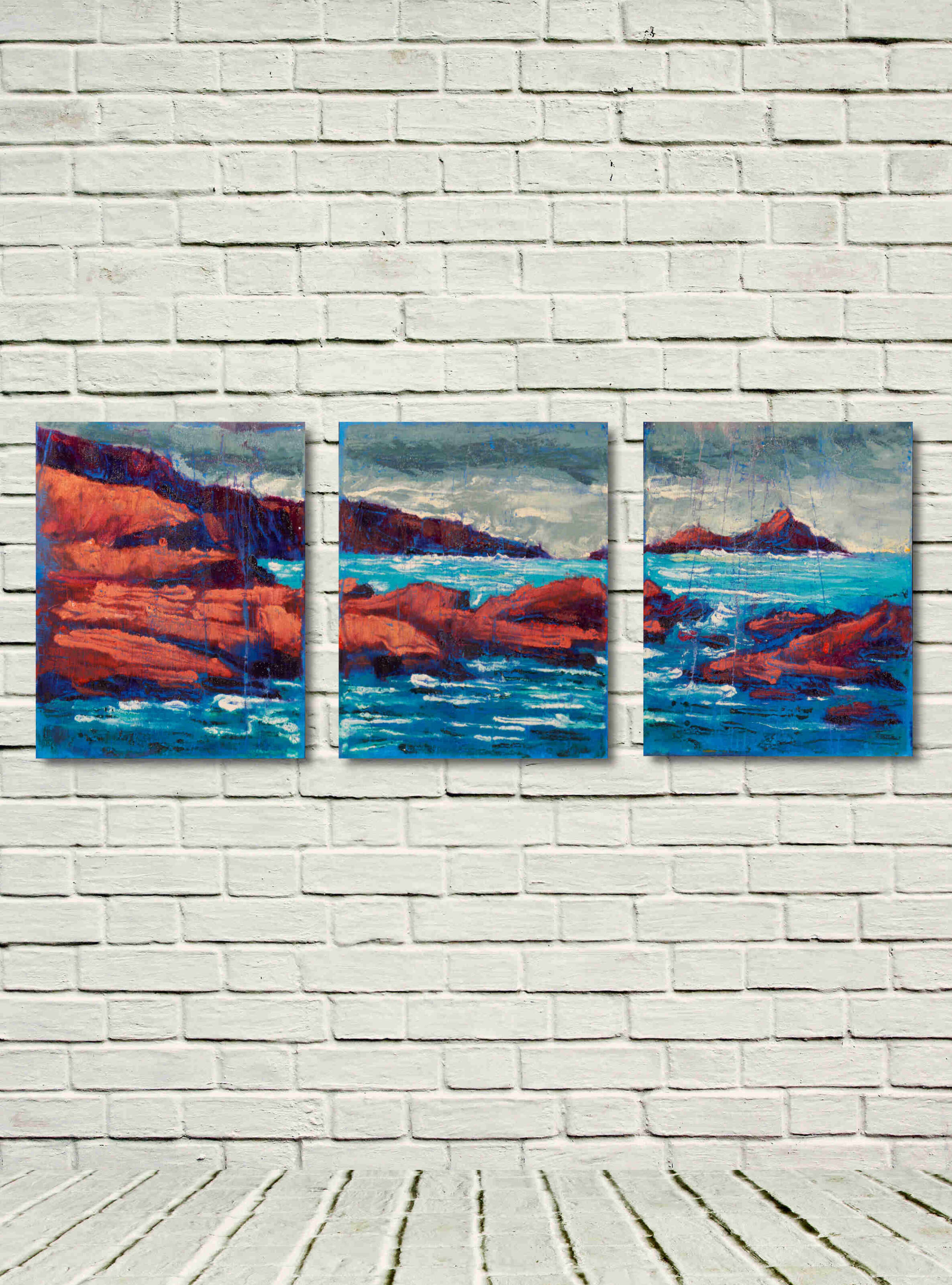 Artist Rod Coyne's triptych "Puffin Sound" is shown here, unframed in a white room.