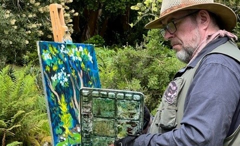 artist rod coyne adds the finishing touches to his painting demo for the workshop at kilmacurragh botanical gardens