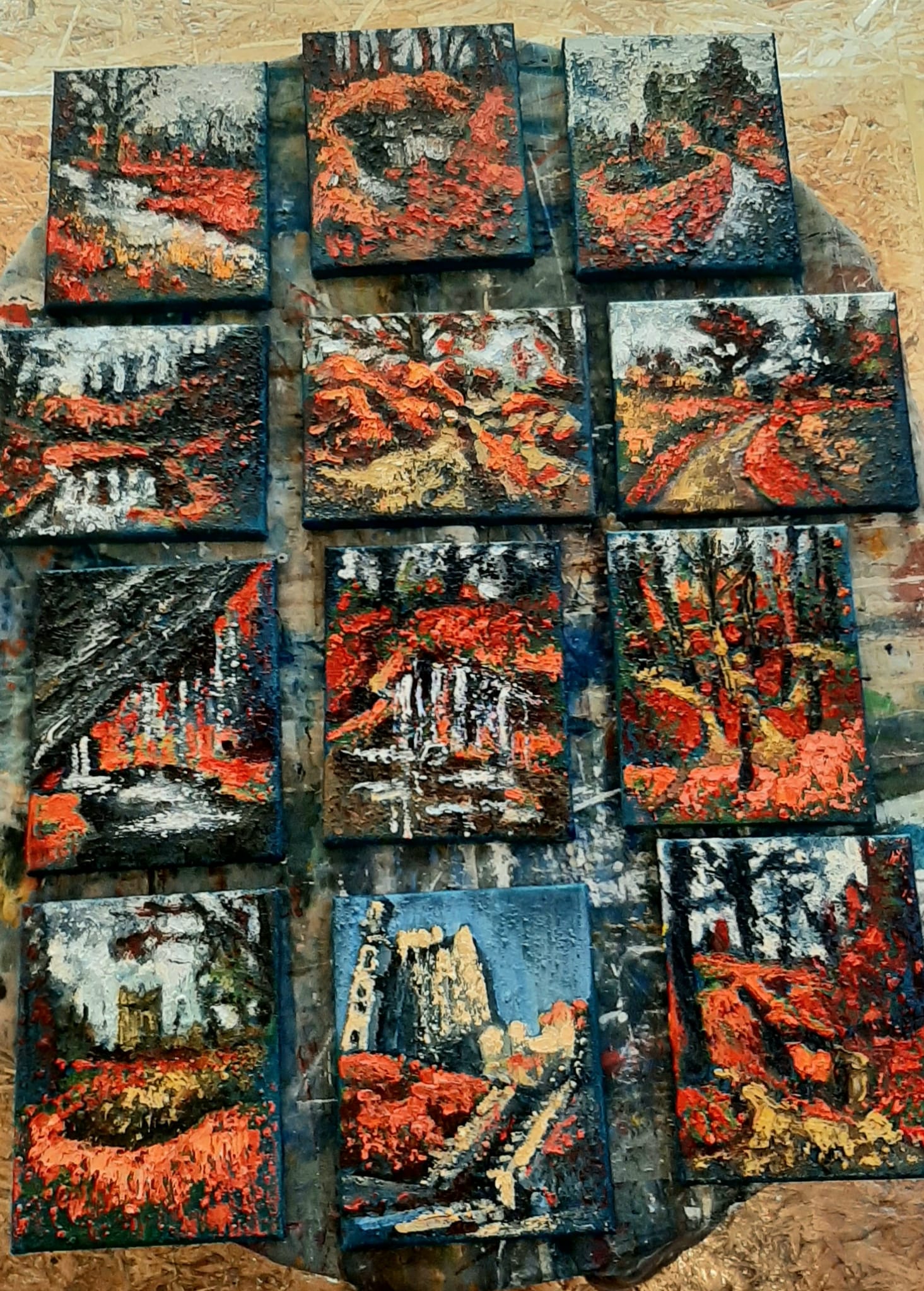 The finished 12 canvases laid out on a table. Blarney Castle & Gardens collection is artist Rod Coyne's new work in progress.